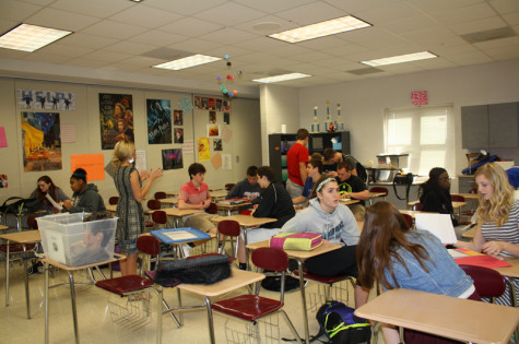 Ms. Hoegger giving her English II students direction for group work. 