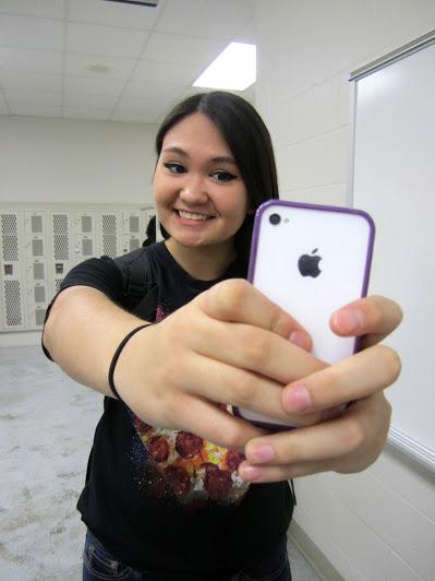 Rebecca Balch (10) smiles for a selfie

