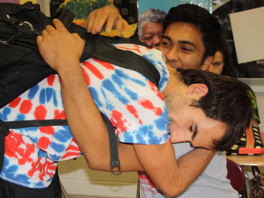 Lucas Lasher (12) and Shravan Pandrangi (12) hug it out in Mr. Suess 7th hour Human Geography class.