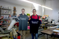 Nickolas Showalter and Tyler Smith learn to make t-shirts at Meltdown Creative Works.