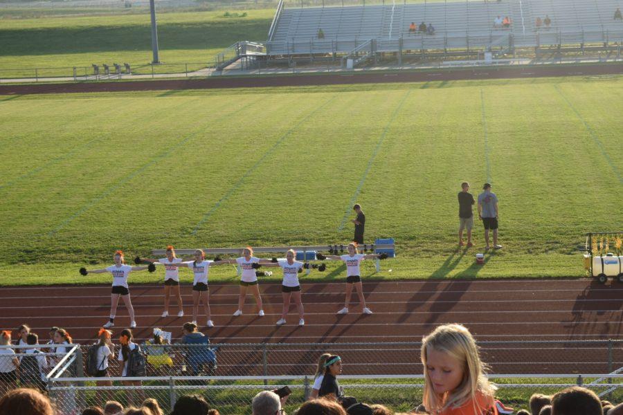 Freshman cheerleaders rally the crowd.