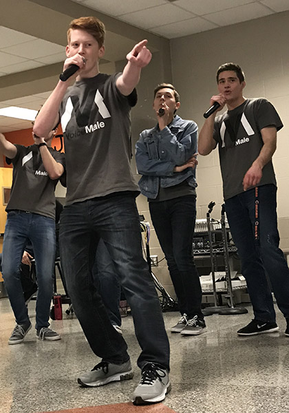 Jonah Oehler (12)  points to the audience when singing, ...if you do what I want you to.
Baby, wed be so fine! from the 1954 Doo Wop song, Sh Boom.