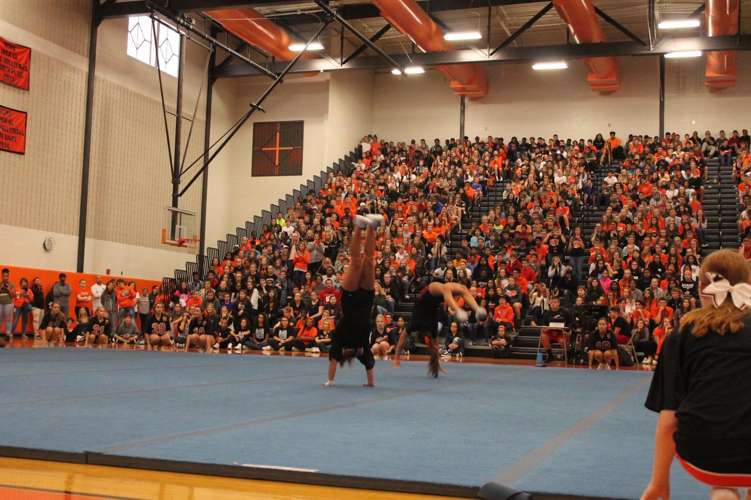 Photo+Gallery%3A+Cheer+team+performs+at+Homecoming+assembly