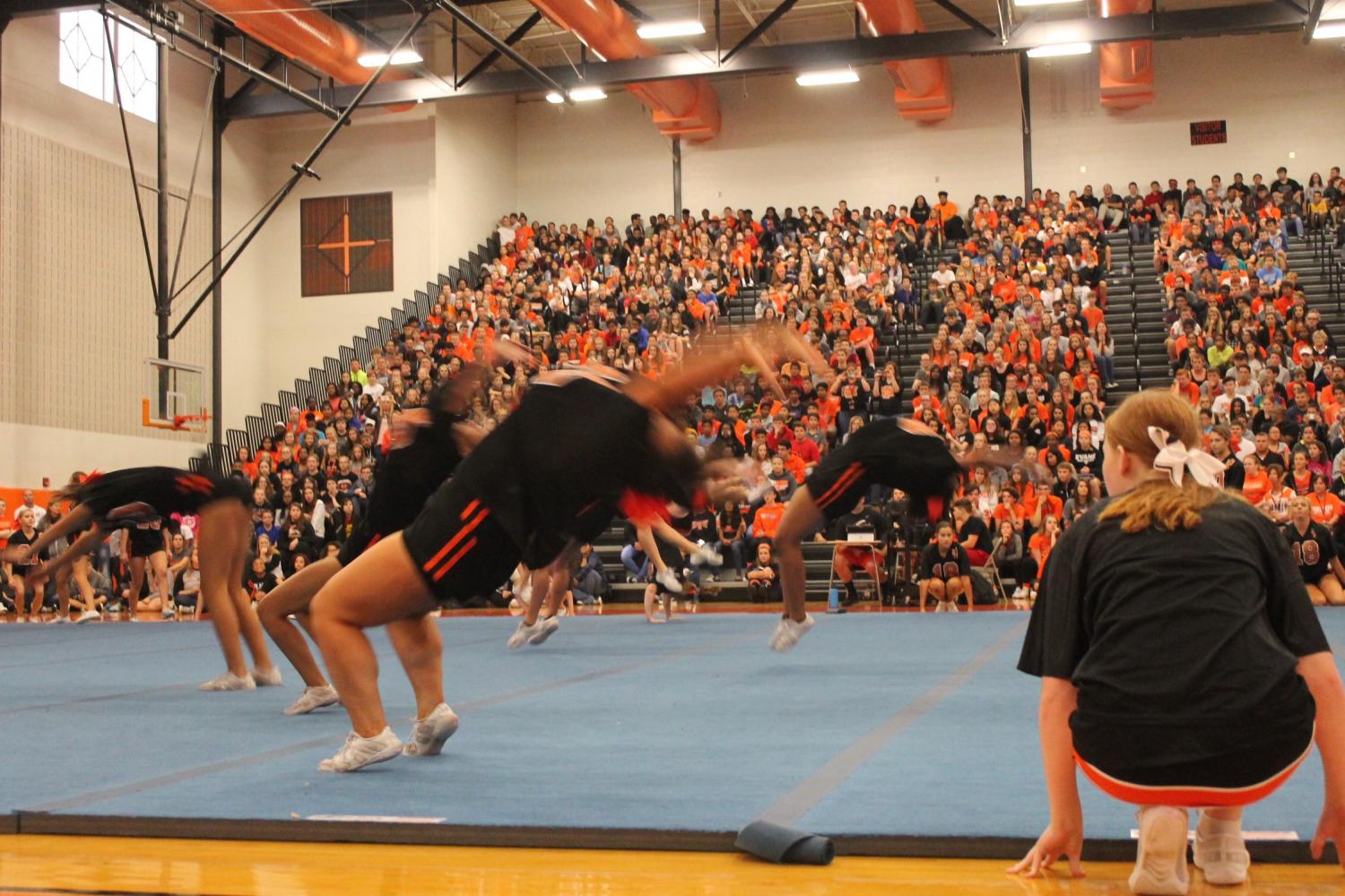 Photo+Gallery%3A+Cheer+team+performs+at+Homecoming+assembly