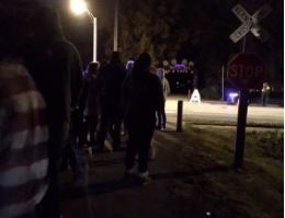 Attendees wait in line to cross Vernon and enter the Haunted Trail.