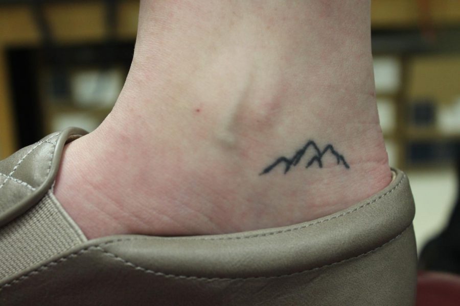 Mollie Bothers (12) has a tattoo of a mountain on her ankle. Mollie and her sister got matching tattoos to represent an important place for their family in Colorado.