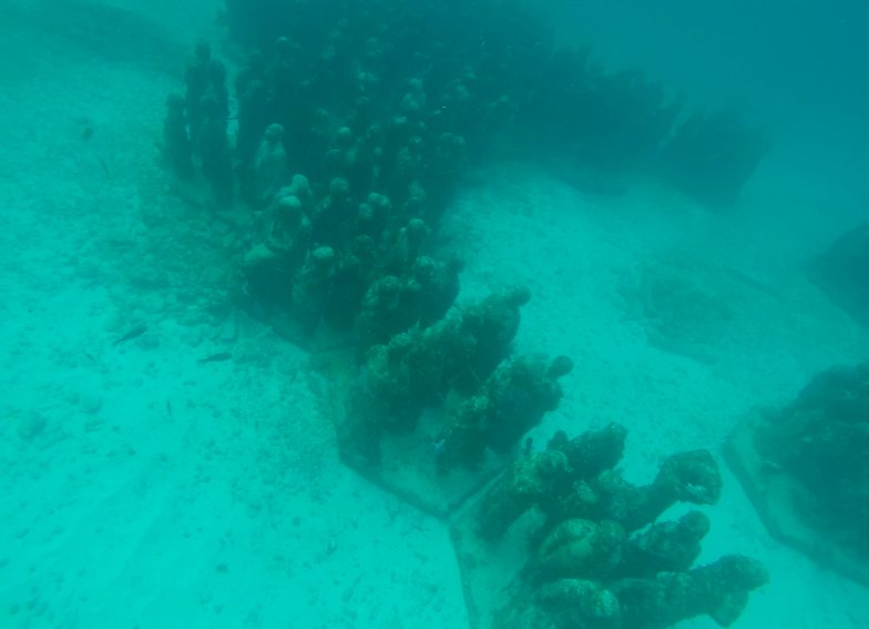 On the way to Isla Mujeres, stop to admire the breathtaking underwater museum  