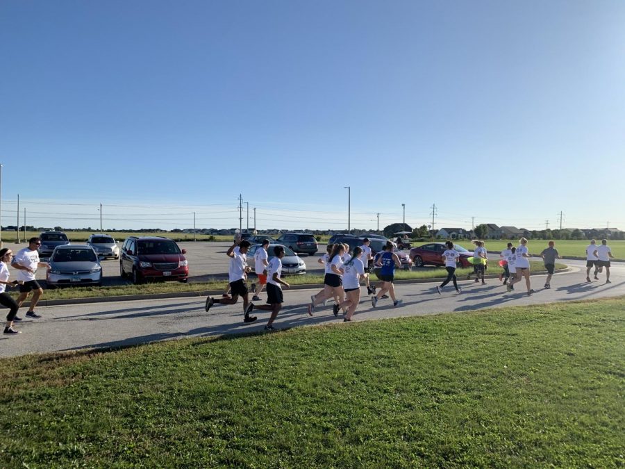 Runners started the race in the athletic parking lot.