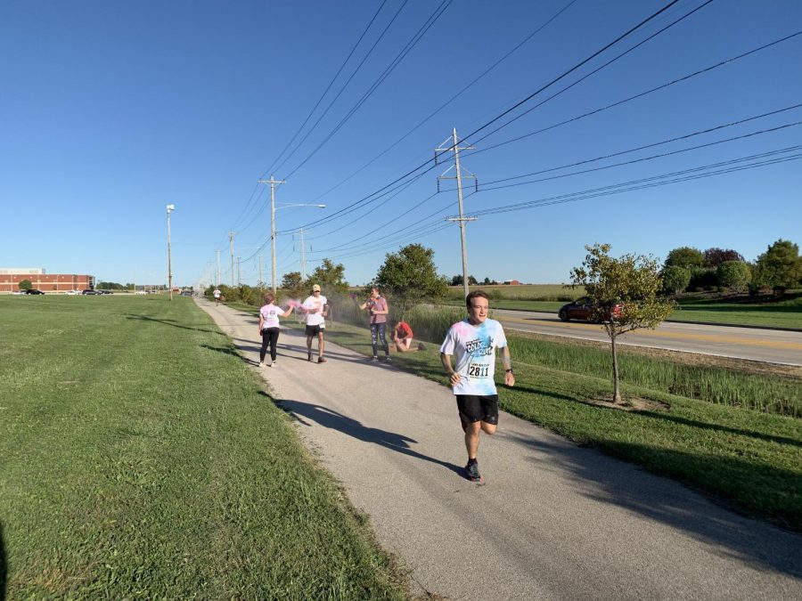 The 5k runners got their first batch of color on the trail along Raab road.