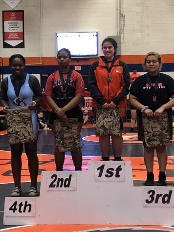 Wrestling team adds female competitors to roster