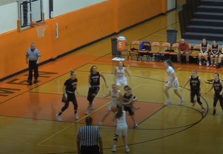 White loads a three-pointer in her senior night game versus Bradley-Bourbonnais