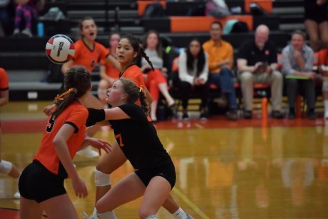 Isabelle McCormick, who hopes to continue playing volleyball in college, passes during a 2019 match against Bloomington. 