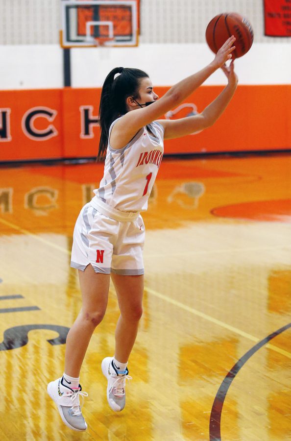 Sophie Feeney (‘23) recorded 13 points and three steals against Peoria Manual.