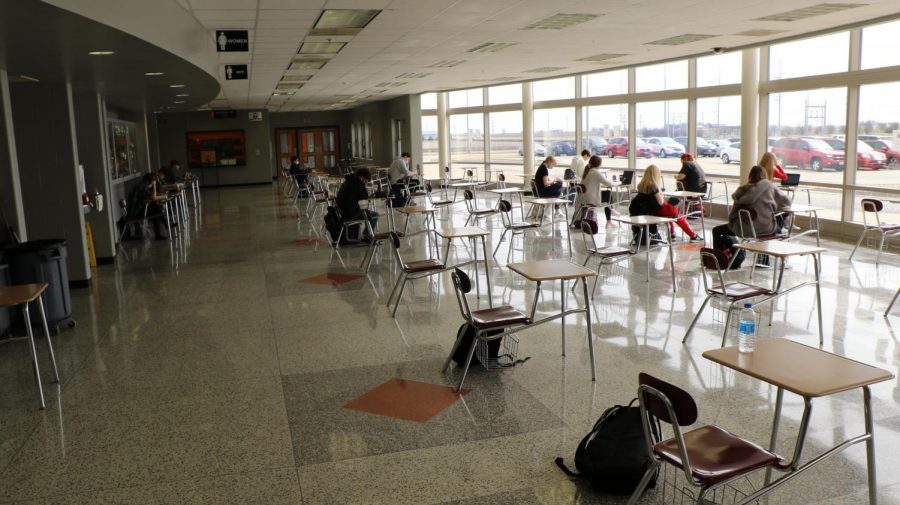 Students are able to socially distance during lunch hours in the fishbowl where desks have been placed for extra seating.