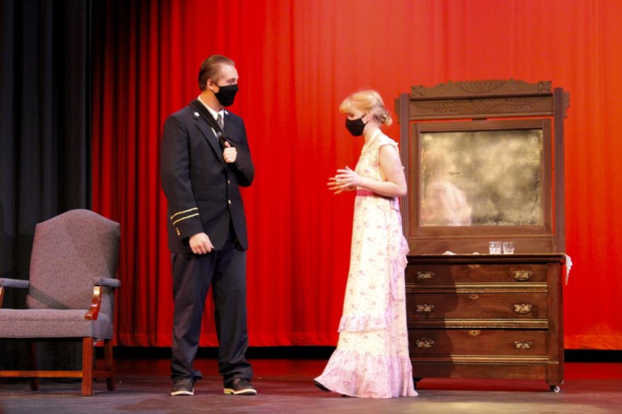 Tray Lund (24) starred as Clifford Gray and Megan Parent (22) as Emmaline Gray in The English Mystery. The mini-play takes place in the time period of World War I during a dinner party following Clifford Grays return home from battle. In this scene. Emmaline addresses Clifford, concerned about his deteriorating memory of home resulting from his time at battle.