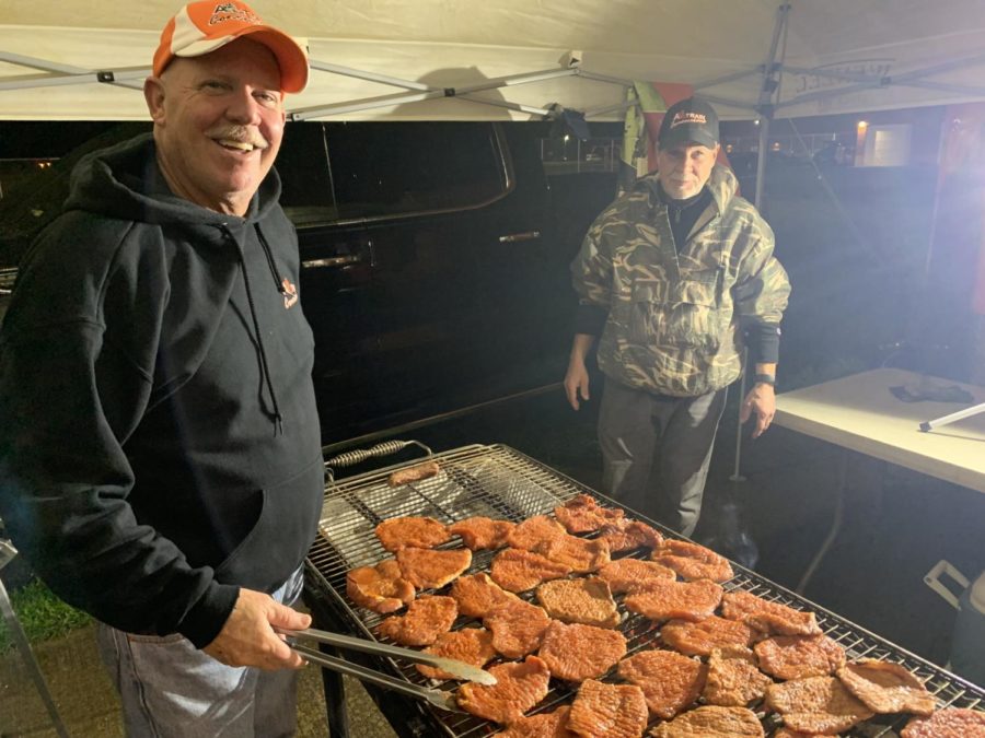 Pickett (left) seen grilling A-Trains signature pork chops at Communitys opening playoff game vs. Blue Island Eisenhower on Friday, Oct. 29.