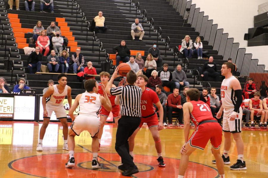 Normal Community tipped off postseason play versus Pekin High School Wednesday night. The Ironmen defeated the Dragons 60-25 at home.