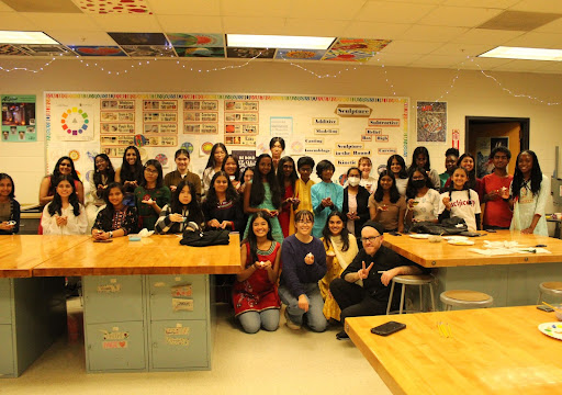 Asian-American & Pacific Islander Culture Club's Diwali attendees group photo in room 36 on October 28.