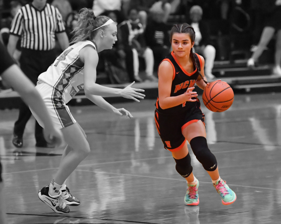 Sophia+Feeney+helped+lead+the+Iron+girls+basketball+team+to+a+State+Farm+Holiday+Classic+Title+this+season.+%0ANow%2C+she+is+being+recognized+as+Holiday+Classic+Scholarship+award+winner+for+her+on-+and+off-the-court+excellence.