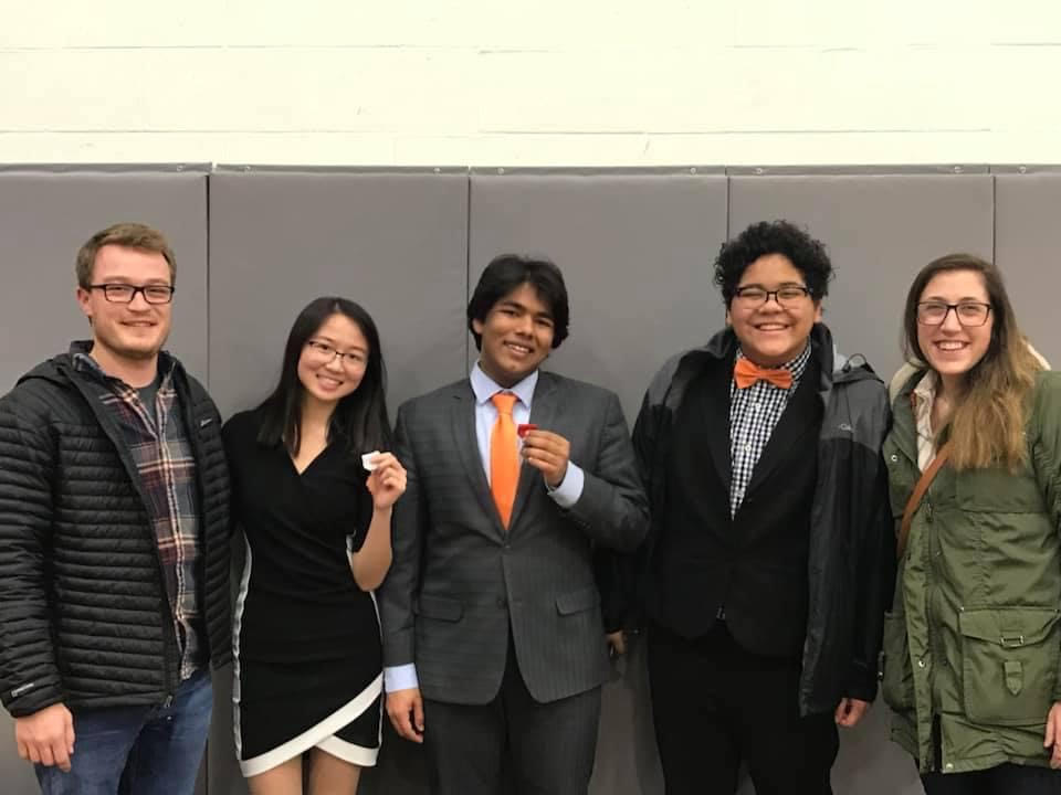 After years of failing to advance a Speech competitor to State, Mantra Dave (center) qualified for the IHSA competition in 2019 with Zemans coaching.