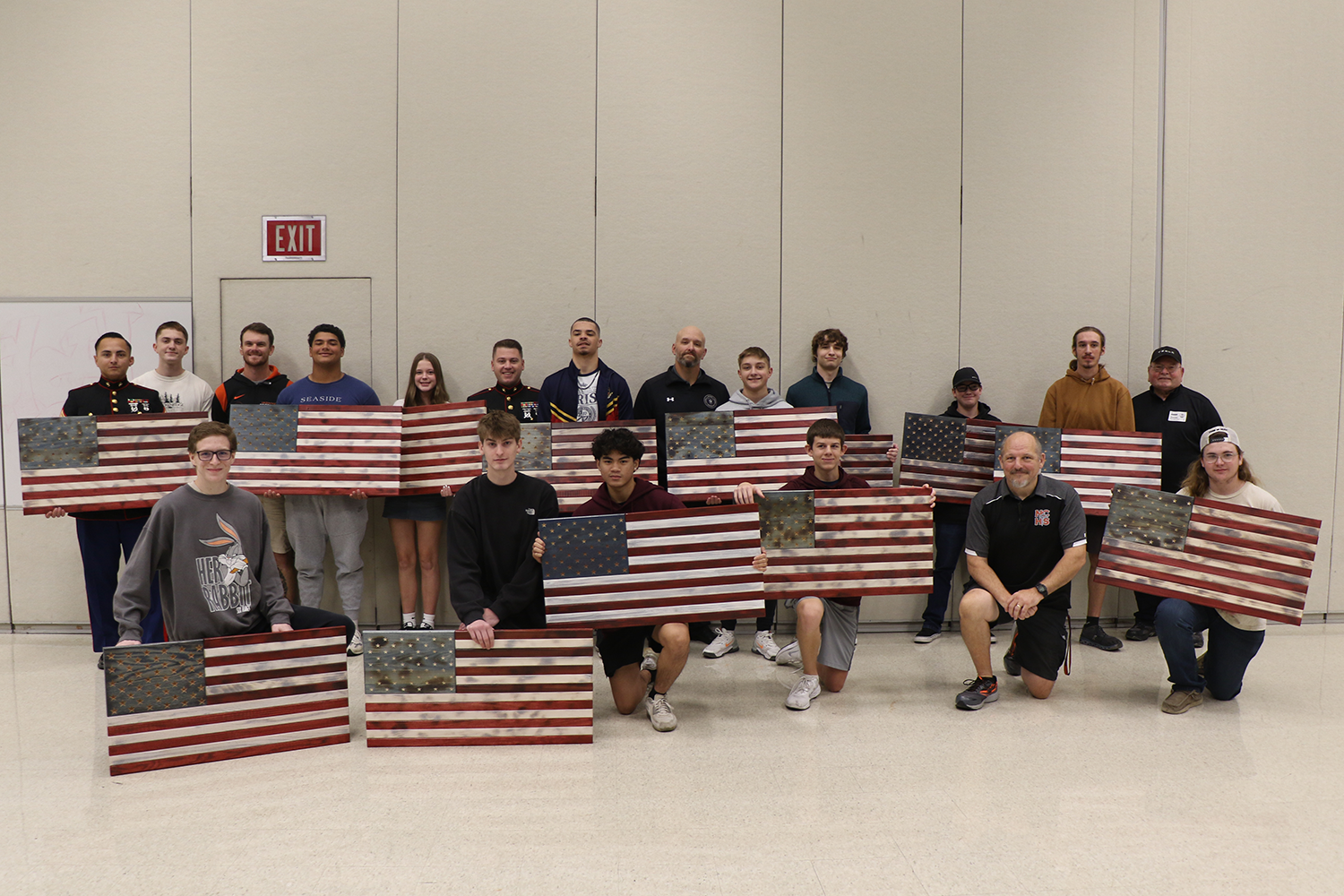 Technology students honor military, law enforcement with hand-crafted flags