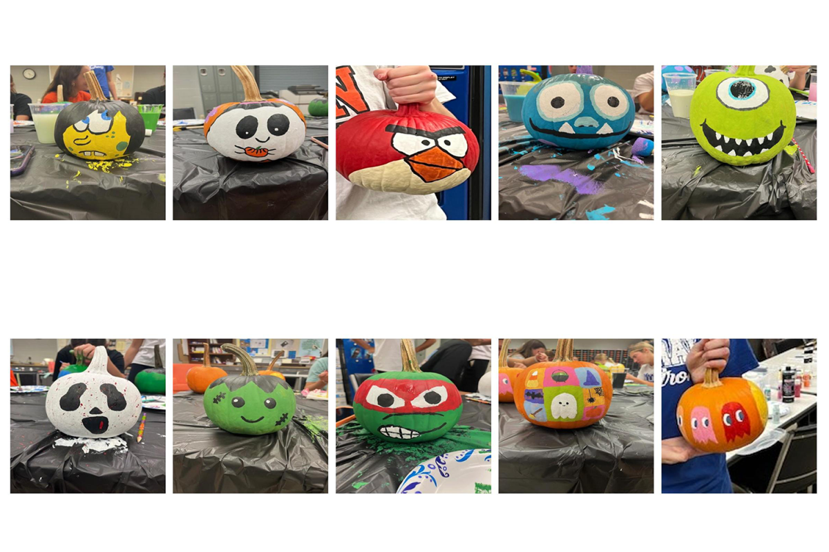 Volleyball builds team spirit with pumpkin painting competition [photo gallery]