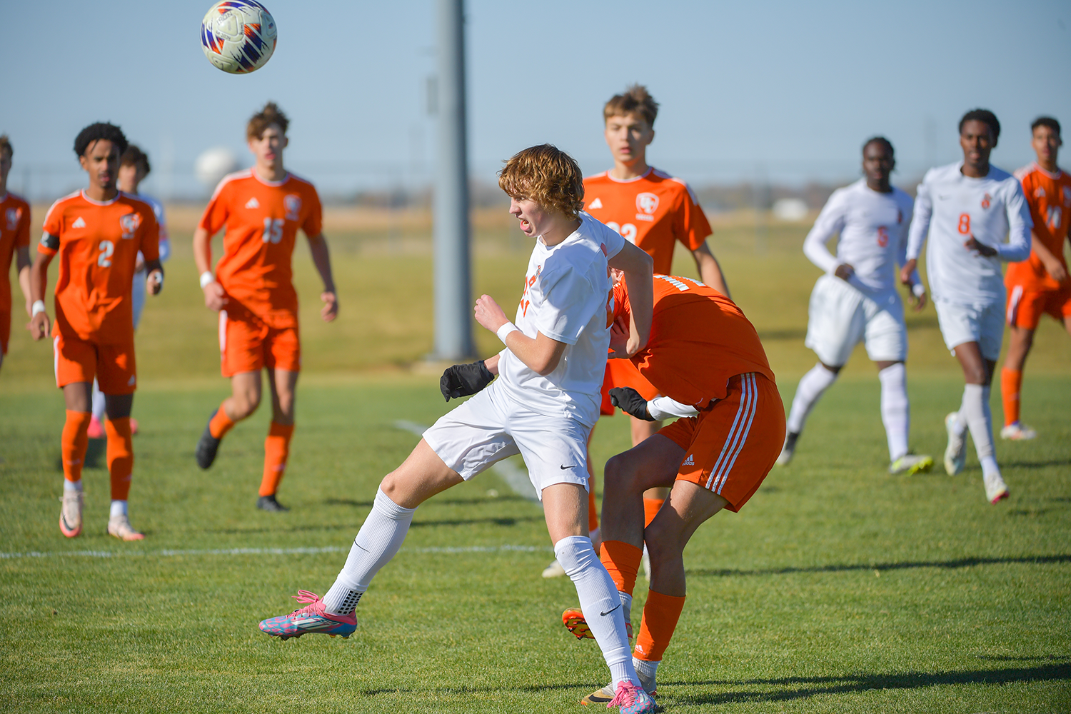 Logan Lelm, pictured here in Community's Regional Championship match versus United Township, was instrumental in the Iron's Sectional Semifinals win-scoring in regulation and converting the go-ahead penalty kick.
The junior is third on the team in scoring after netting his eighth goal of the season against the Maroons off of a a Joyce Lubika assist. 
Lubika has 11th assists this season, tied for a team first with Believe Avida.
Photo Courtesy of: Mr. Jeff Christopherson