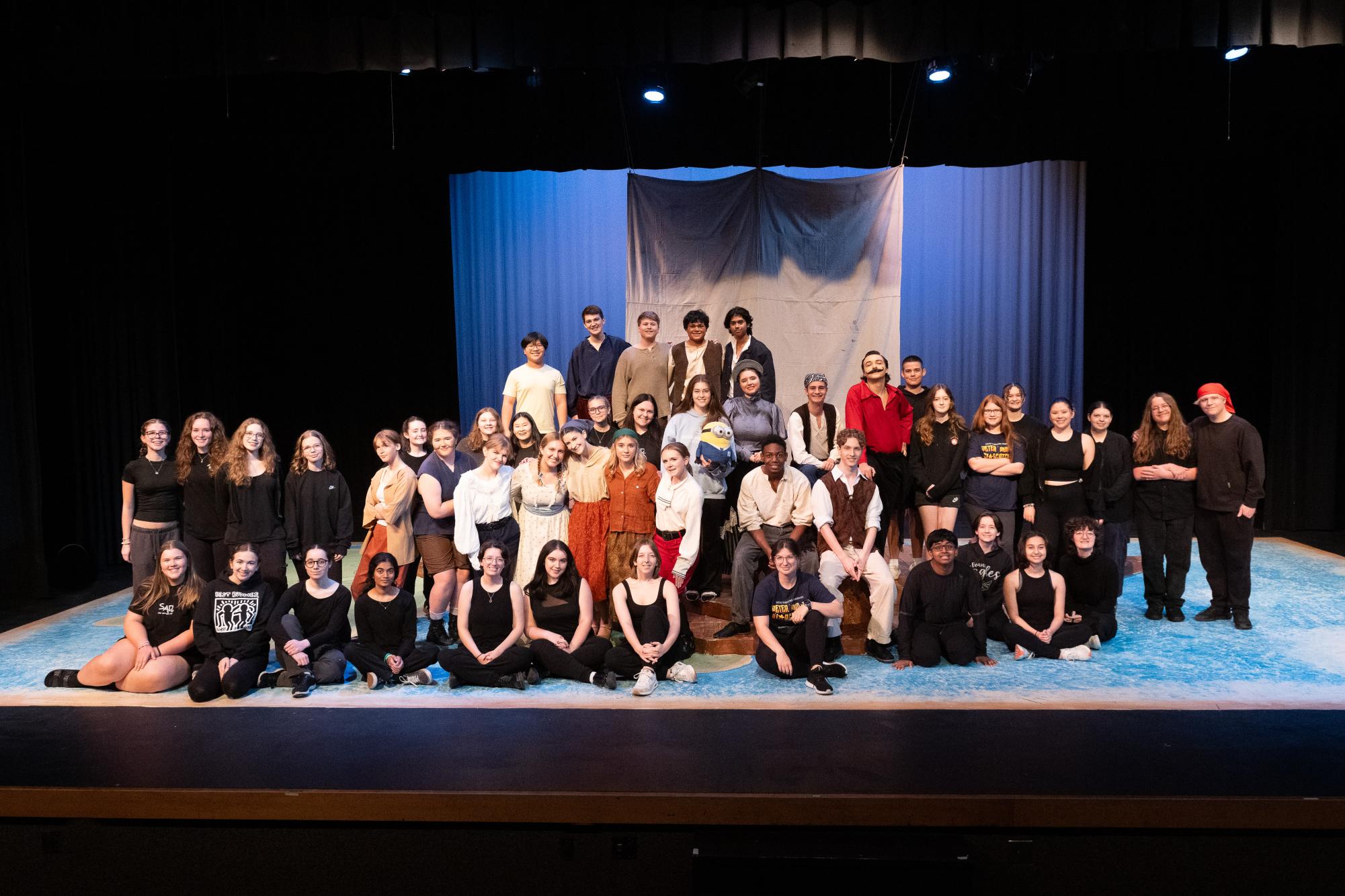 Gus, the mascot of the Community theatre program, front and center in the "Peter and the Starcatcher" cast and crew picture.
Photo Courtesy of: Mr. David Vernon