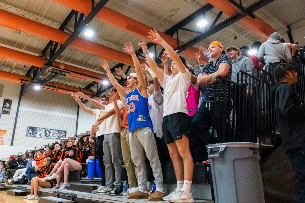 Community's East Gym saw a packed crowd for the cross-town rivalry game.