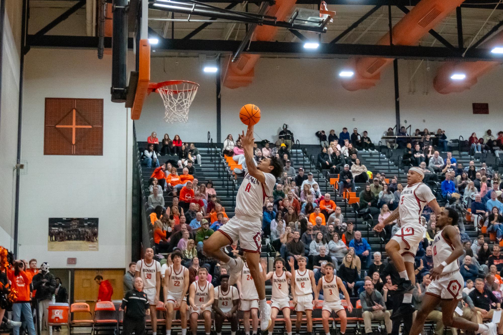 Senior guard Conner Smith slammed down a dunk on the fast break, his teammates reacting and jumping with him. Smith, who averages 6.6 points per game, contributed six points in the game.