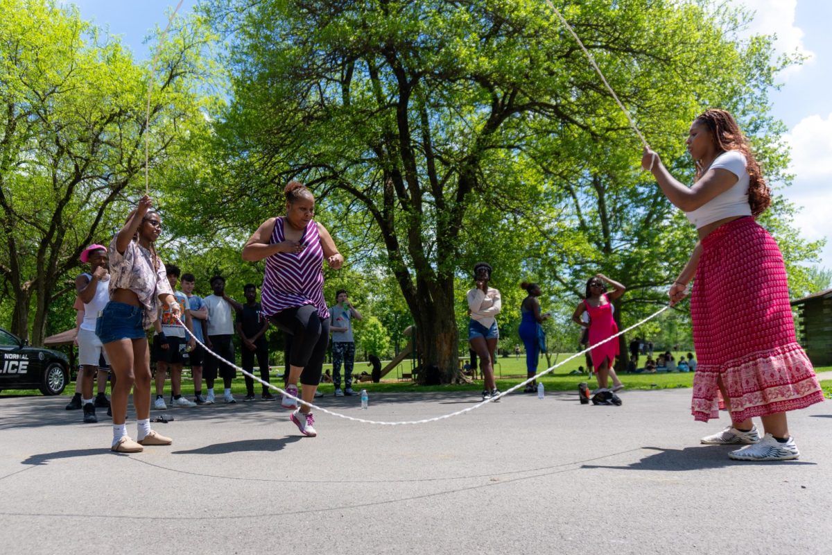 Teaching Assistant and Senior Picnic chaperone Ms. Kai Bradley joined in the game, reminding her of what was once a childhood staple. "You just get your friends, your girls, and—whether we're in a driveway or the middle of the street—[have] a good time."