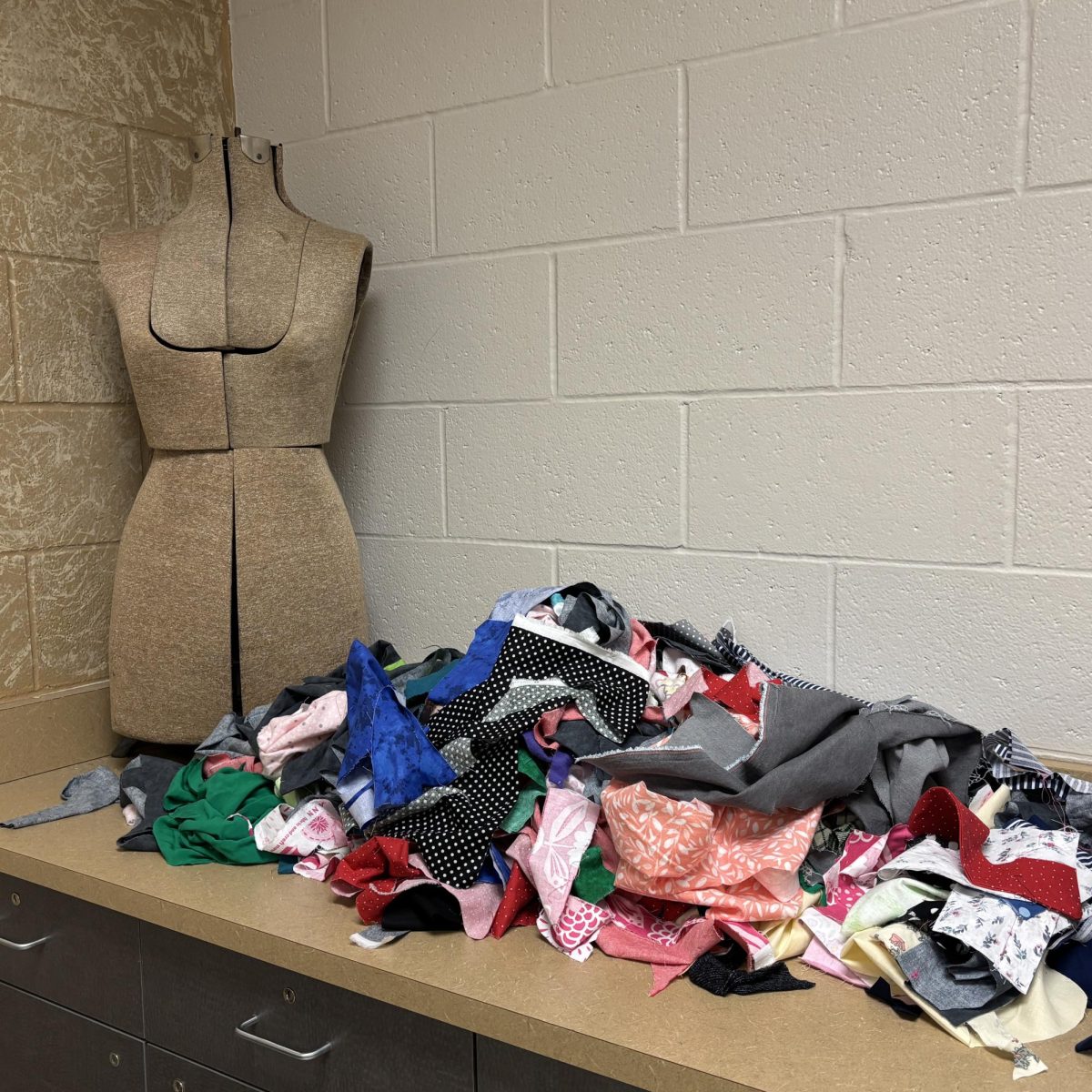 In the Family and Consumer Science department, department head Mrs. Laura Thomas said the store closure will not have a severe impact with other local and online retail options. But it won't go unnoticed. 
In Thomas's classroom, a dress form stands beside a countertop piled high with colorful fabric scraps—a visual reminder of how frequently students rely on fabric materials for their clothing construction projects.

