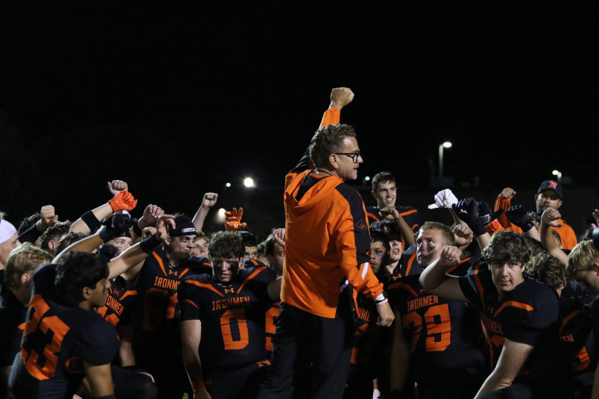Head coach Mr. Jason Drengwitz addresses the Ironmen after a dominant team effort, highlighted by touchdown catches from three different receivers and a pick-six in the lopsided win.