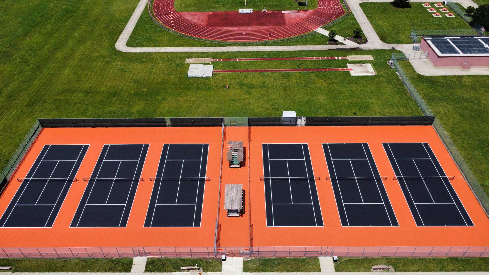 Community's tennis courts were resurfaced and repainted as part of the district's summer maitenance work. 

Photo Courtesy of: Community Athletic Department 