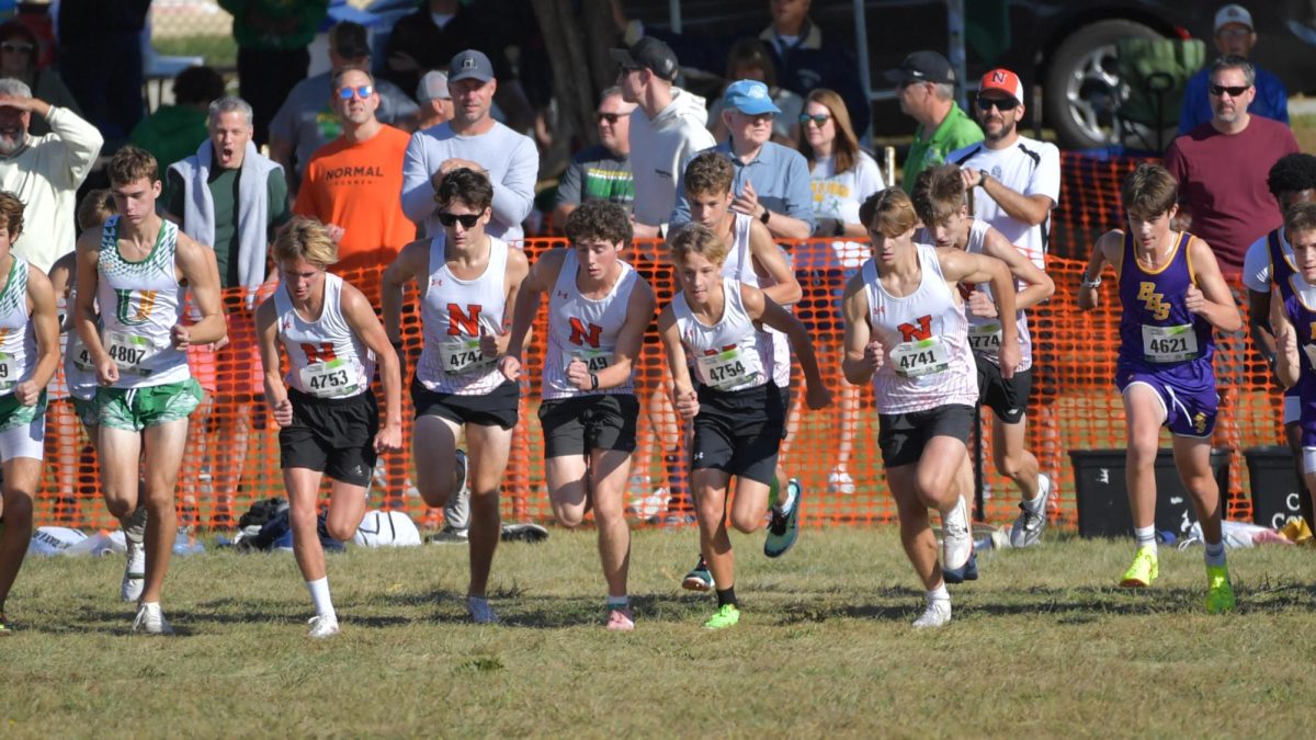 AJ Ince, center, has led the Ironmen x/c this season, finishing no worse than 2nd in each of the team's meets.