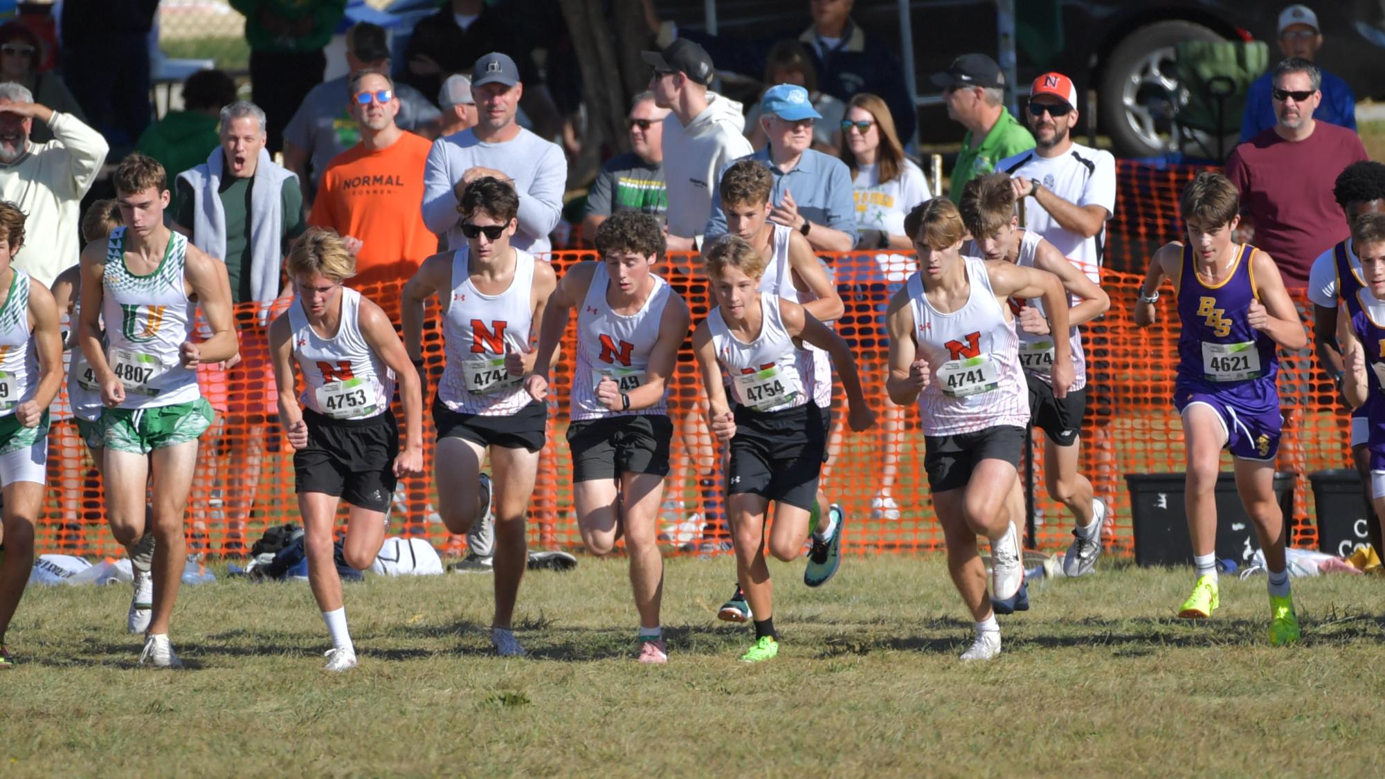 AJ Ince, center, has led the Ironmen x/c this season, finishing no worse than 2nd in each of the team's meets.
