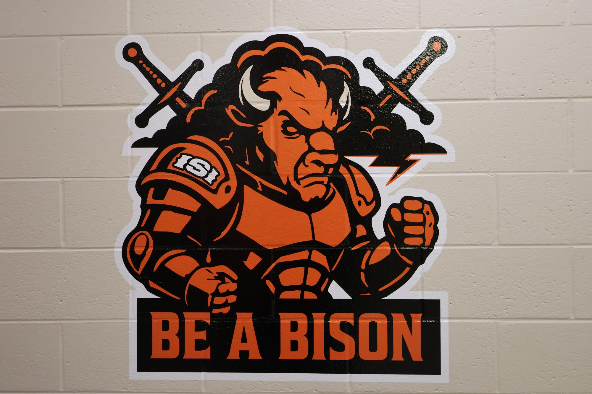 This fall, the Great Display Company added additional graphics to the girls baskeball locker room. 
“Be a bison” is the Iron's mantra for the  2025–26 season. 
“A bison,” Feeney said, “faces the storm head on.”