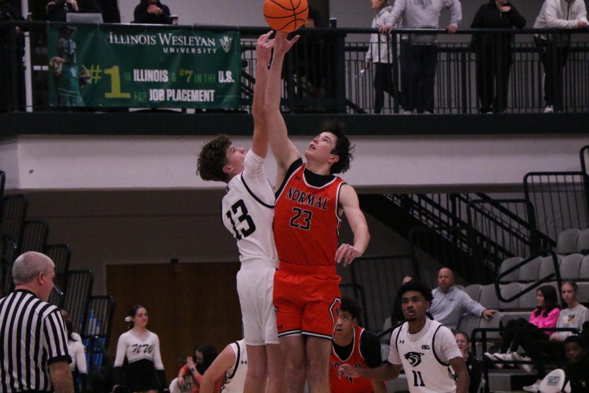 Chase Kasten rises for the opening tip in Community’s season opener. 

The sophomore has been a steady two-way force in the Ironmen’s 7-0 start, coming up big with 18 points and 11 rebounds in the win over Champaign Central.