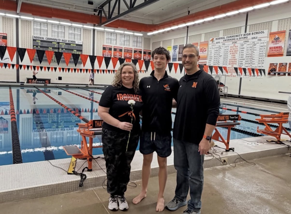 Senior Wade Pyle poses with his parents on senior night during a record-setting season.

Photo Courtesy of: Iron Athletics Instagram // @iron_athletics1